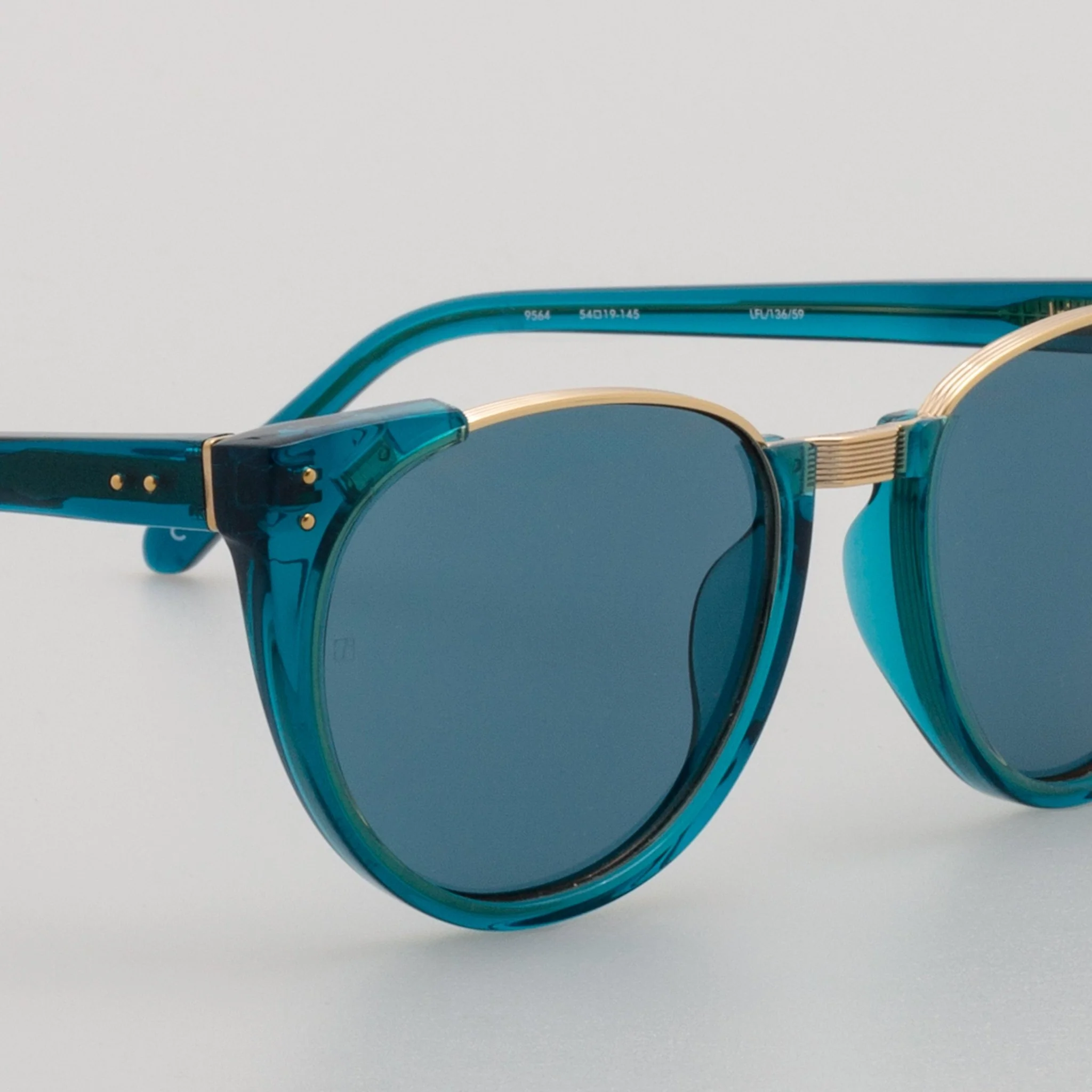 Iris Oval Sunglasses in Aqua - Image 4