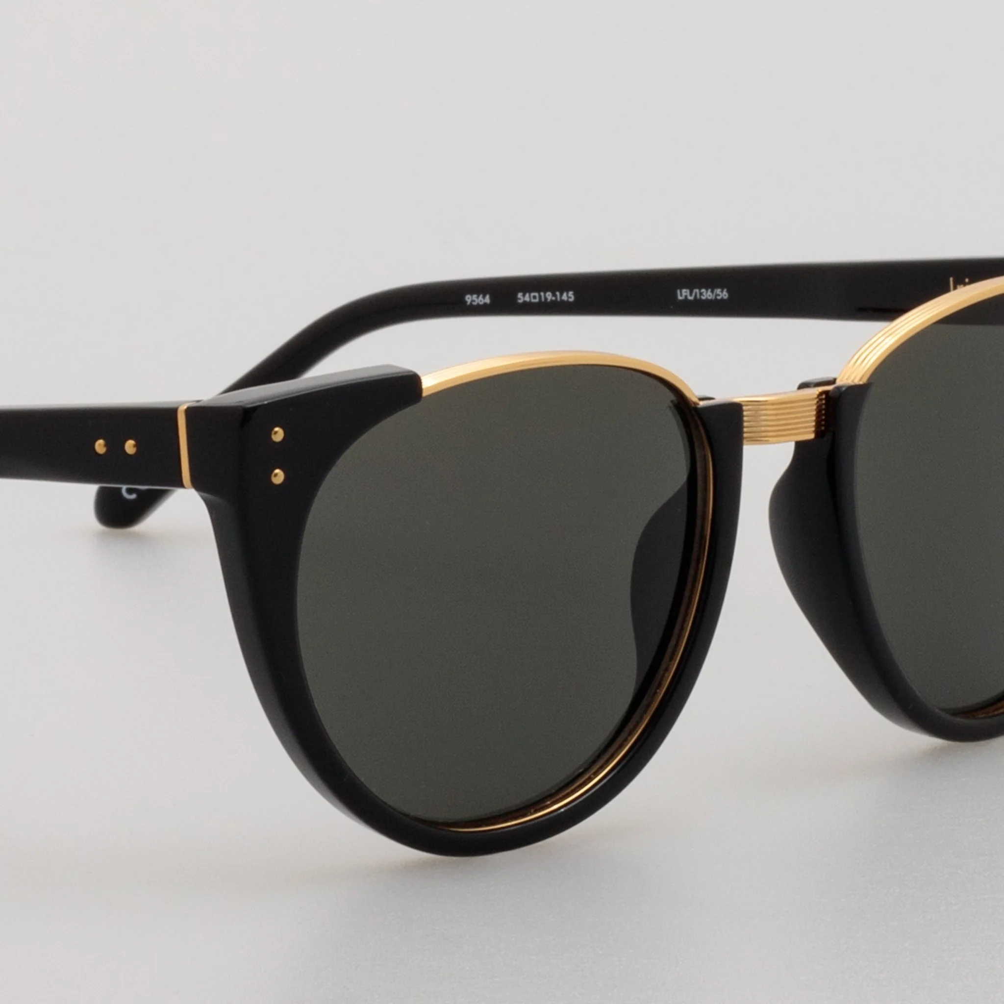 Iris Oval Sunglasses in Black - Image 4