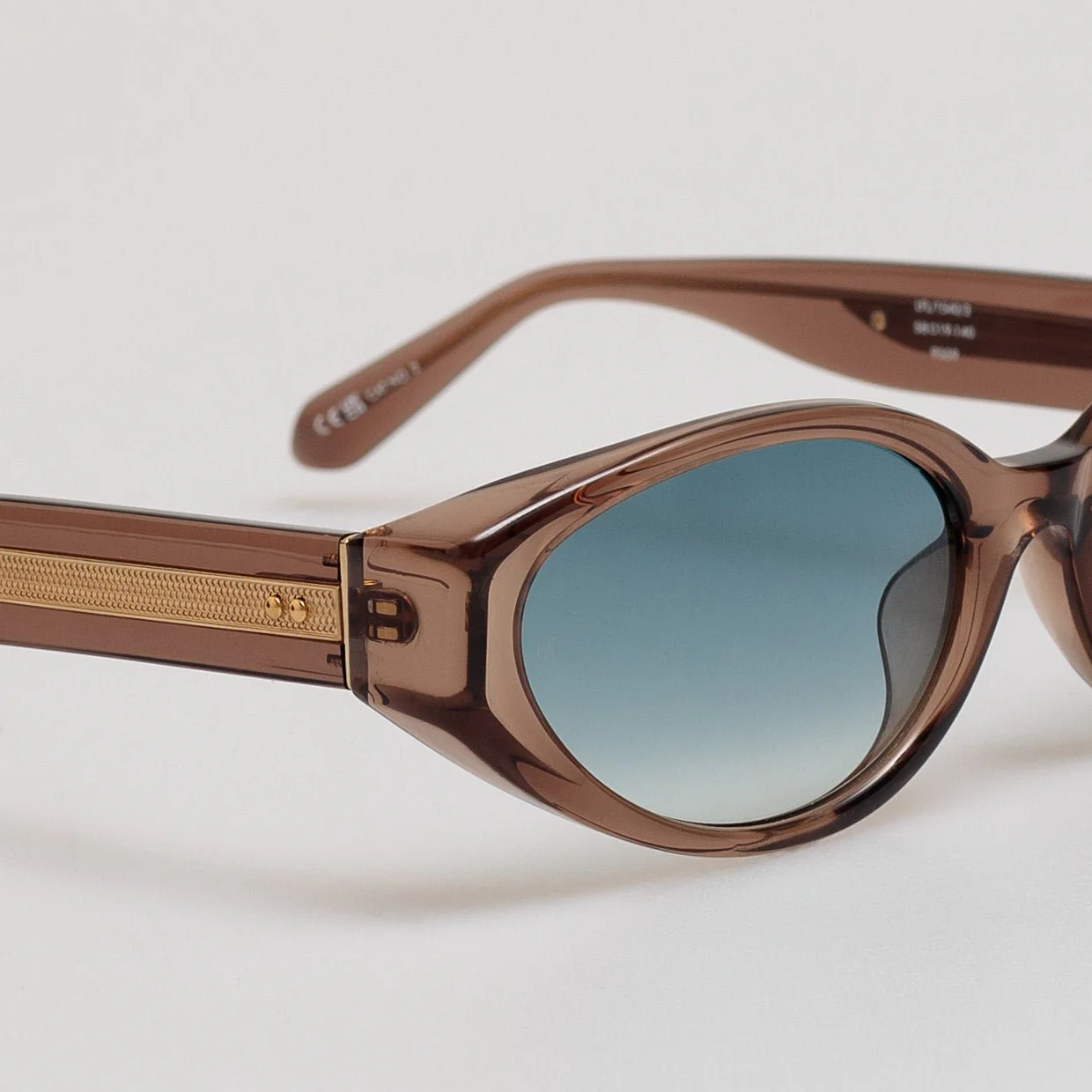 Lyra Oval Sunglasses in Brown and Aqua - Image 4