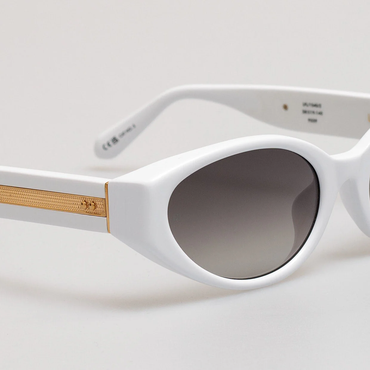 Lyra Oval Sunglasses in White - Image 4